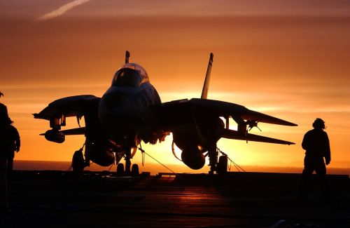 military jet fighter aircraft carrier sundown