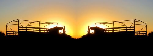 Mirror Image Of Truck In Sunset