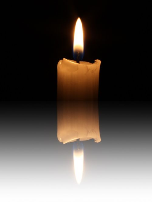 mirroring candle candlelight