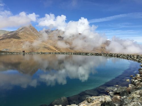 mirroring lake clouds