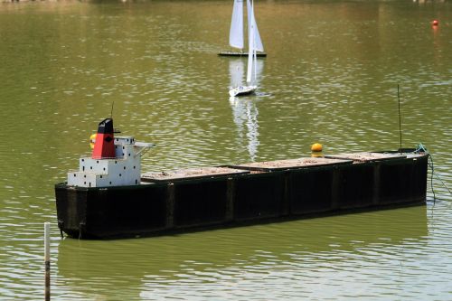 Model Container Boat On A Pond