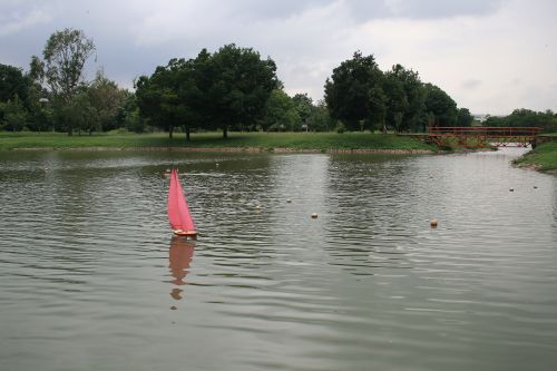 Model Yacht With Red Sails