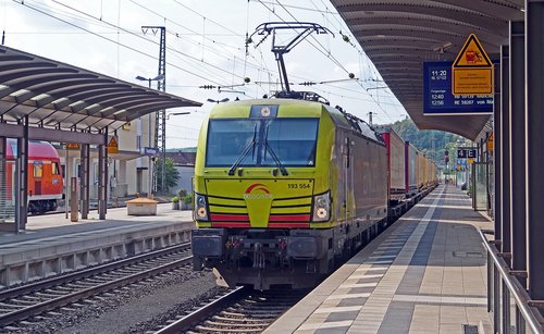 modern freight train  private railway  railway station
