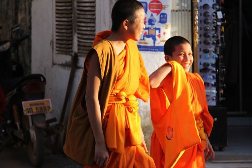 monks walking luang prabang