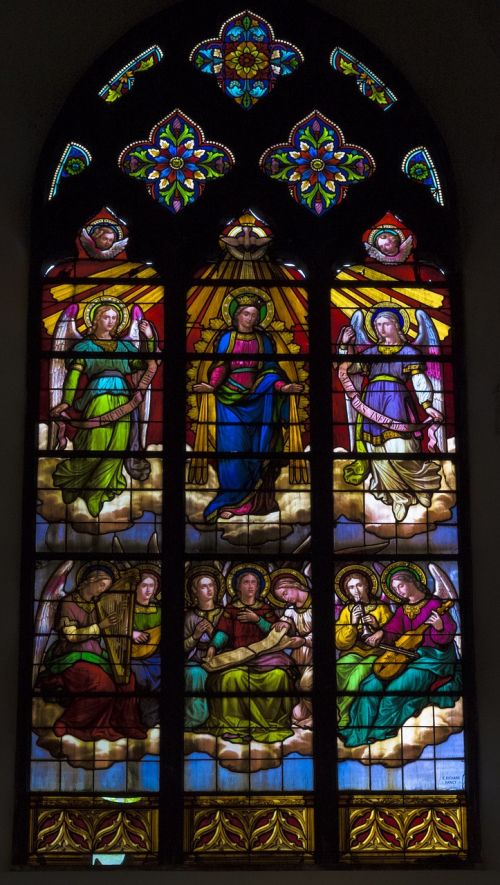 mons church stained glass windows