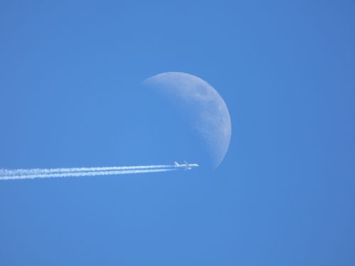 moon plane sky