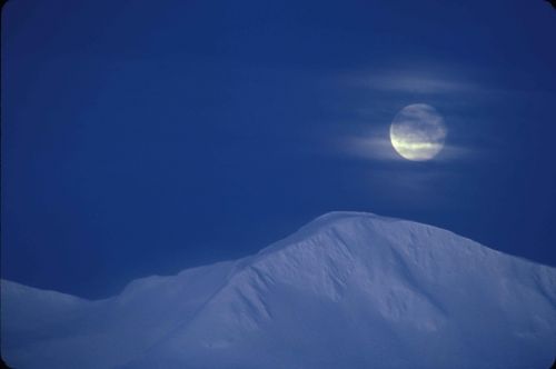 moonrise mountains snow