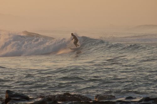 morning surfer beach