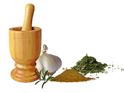 mortar spices head of garlic