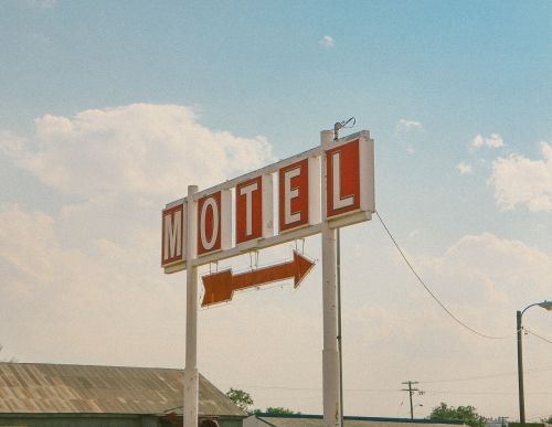 motel sign arrow