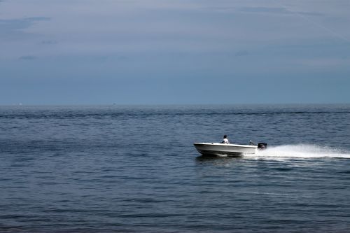 Motor Boat Surfing On The Sea