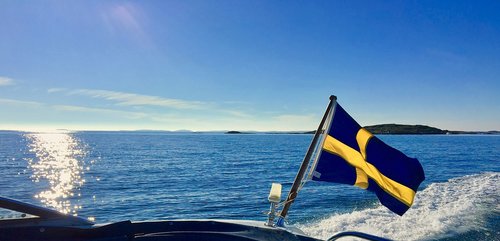 motorboat  sweden  swedish flag