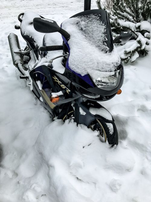 motorcycle snow snowdrifts