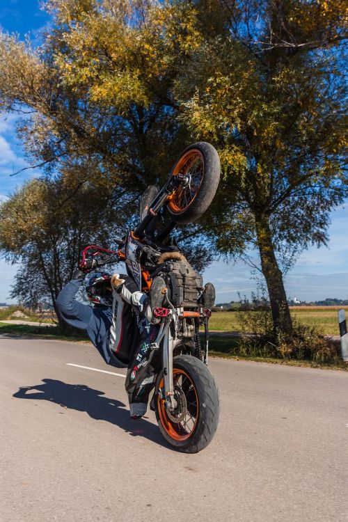 motorcycle wheelie road