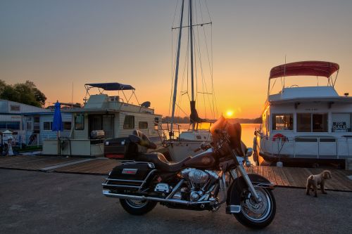 motorcycle boat sunrise