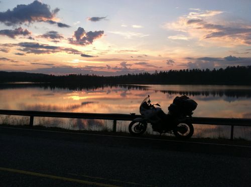 motorcycle sunset lake