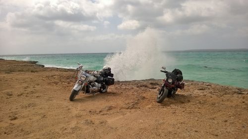 motorcycles sea wave