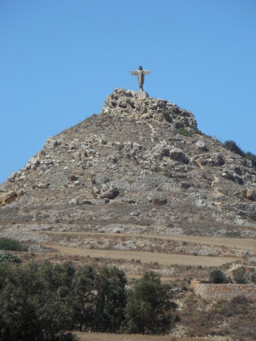 mountain statue summit