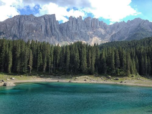 lake carezza dolomites forest