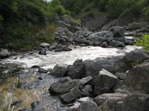 mountain river between mountains rocks