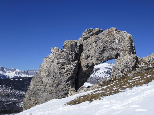 mountain breakthrough rock snow