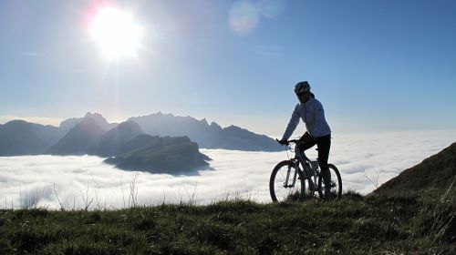 mountain bike säntis above the clouds