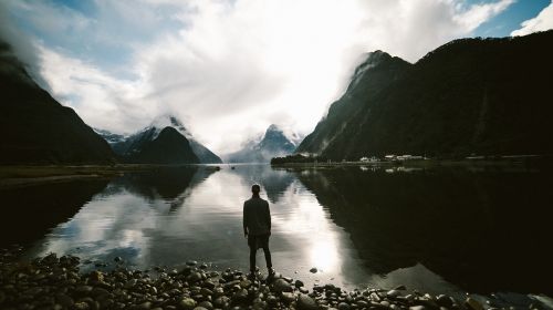 mountain lake person reflection