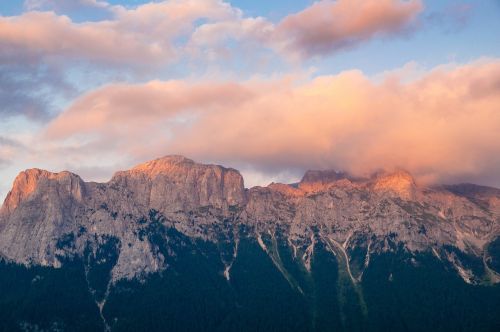 mountain range afterglow clouds