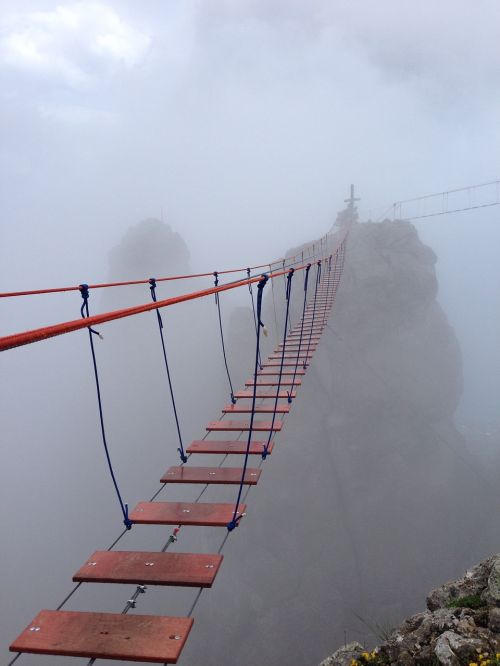 mountains fog bridge