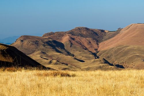 mountains grassland landscape