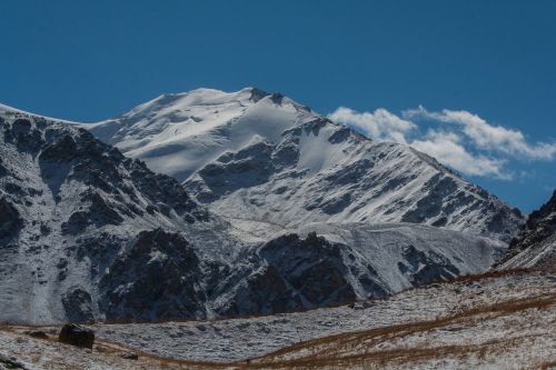 mountains snow clouds