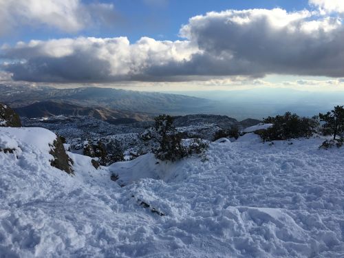 mountains snow clouds