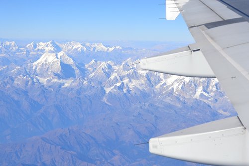 mountains  airplane  wing