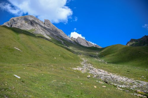 mountains  slope  meadow