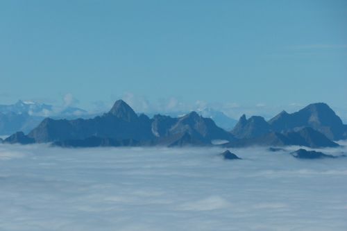 mountains summit sea of fog