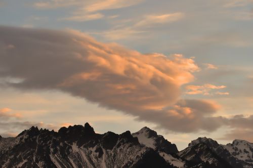 mountains summit clouds