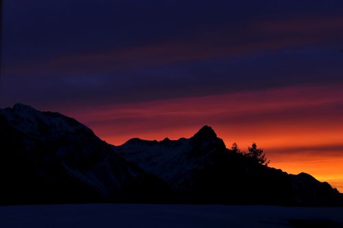 mountains mountain peaks sunrise