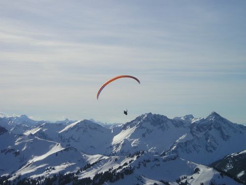 mountains paragliding fly