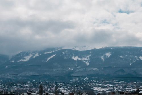 mountains city snow