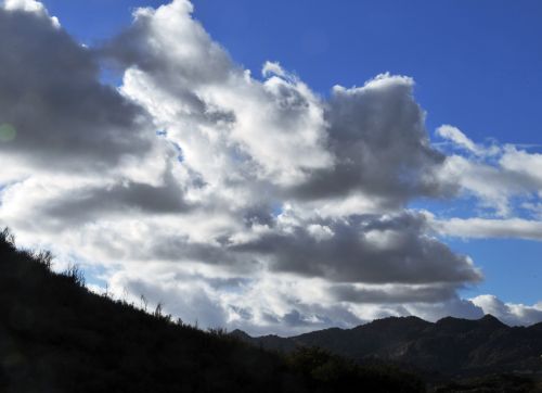 Mountains And Cloudy Sky