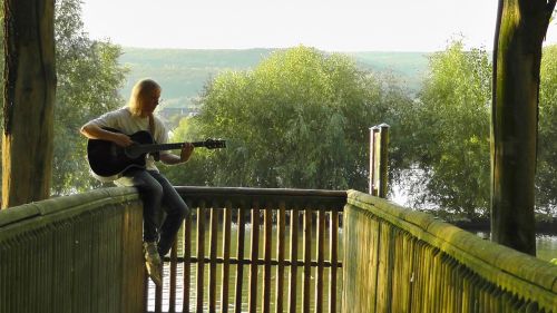 musician guitar player railing