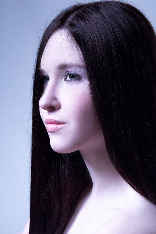 mystical portrait of a girl eyes black background