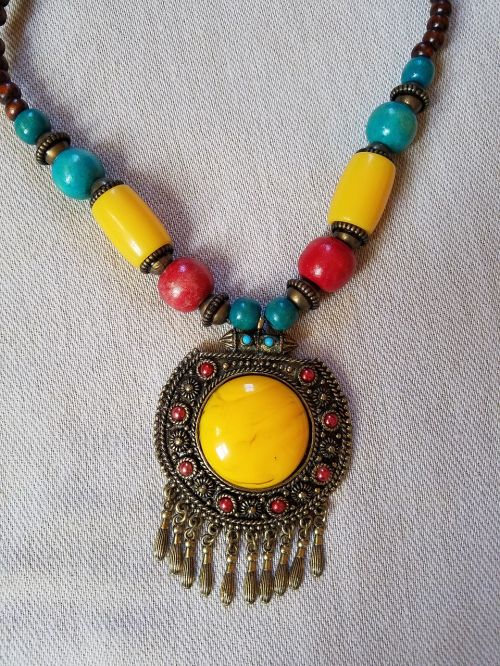 necklace blue yellow red and brown jewel