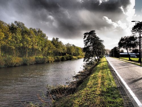 netherlands canal clouds