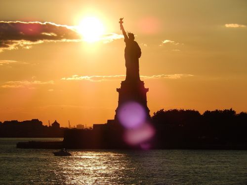 new york statue of liberty sunset