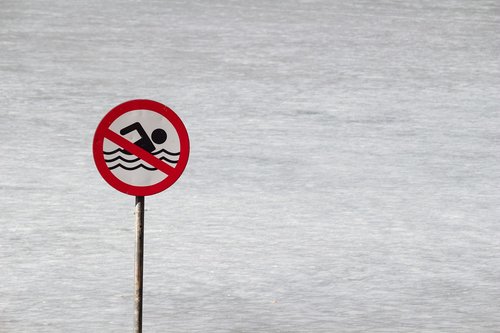 no swimming  stop  forbidden sign