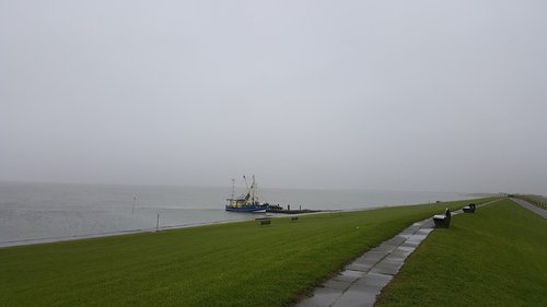 north sea  dam  fog