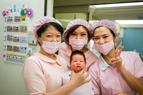 nurse newborn baby
