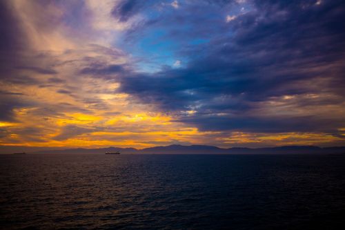 ocean sunset boats