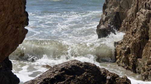 Ocean Wave And Rocks